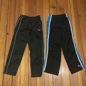 Bundle deal. Blue and black puma sz6 sweats w/black &white stripes Nike sweats